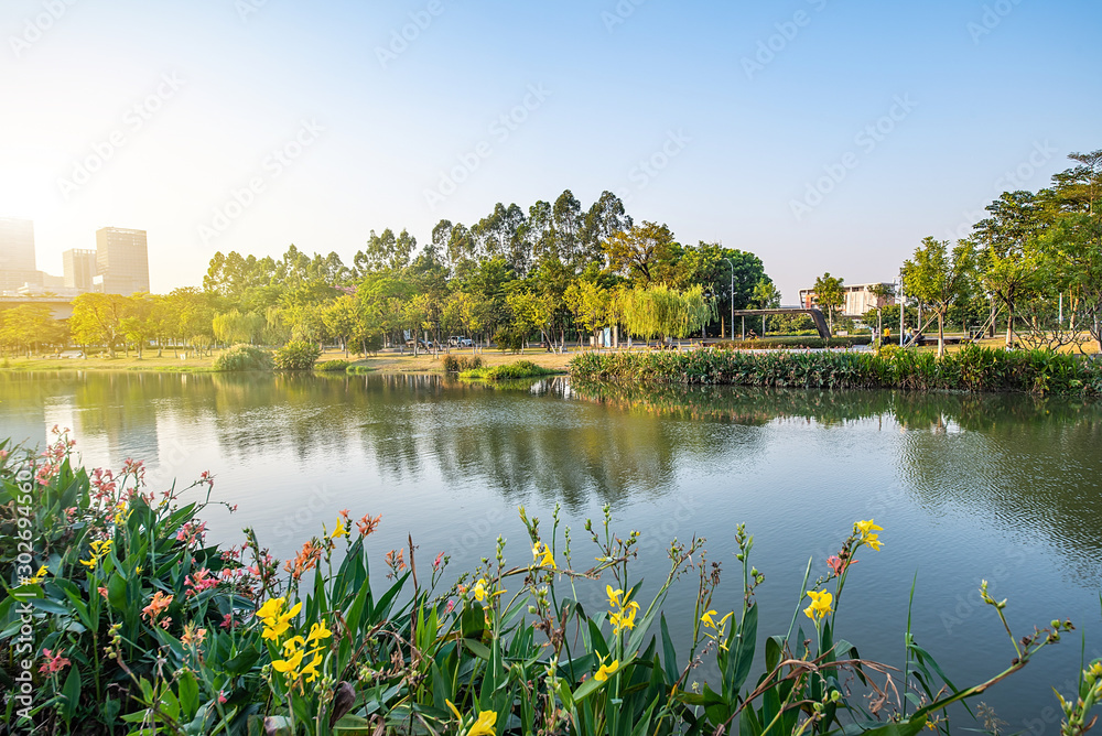 Beautiful riverside waterfront high-rise residential community environment background material