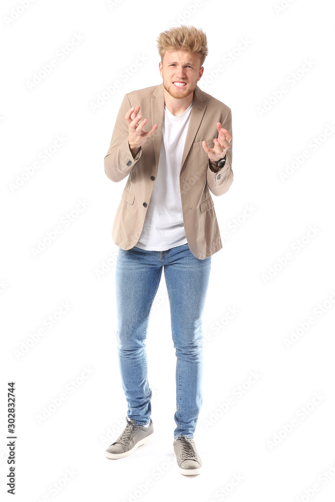 Portrait of angry man on white background