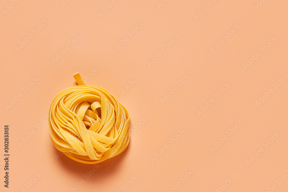 Dry pasta on color background