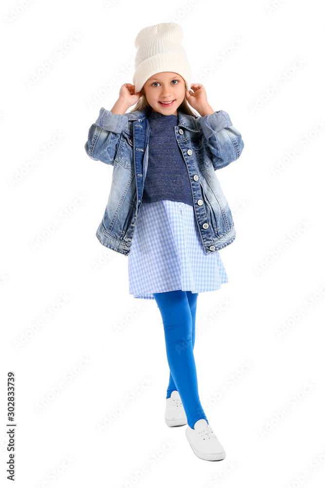 Fashionable little girl in autumn clothes on white background