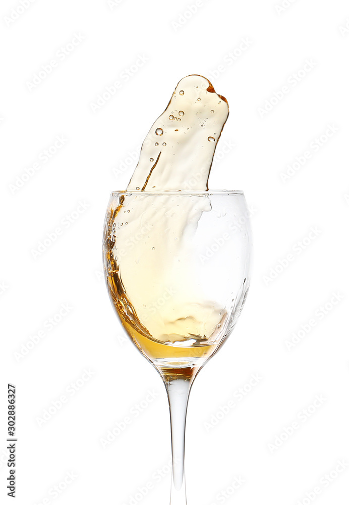 Glass of wine with splash on white background