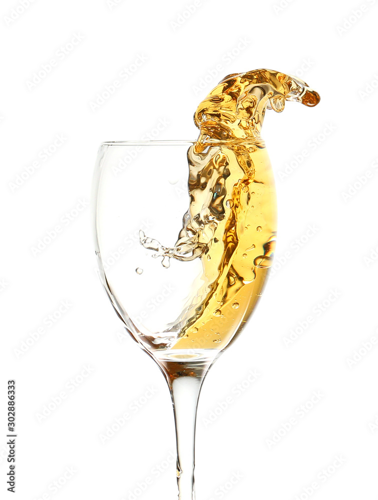 Glass of wine with splash on white background