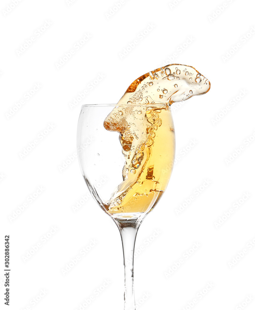 Glass of wine with splash on white background