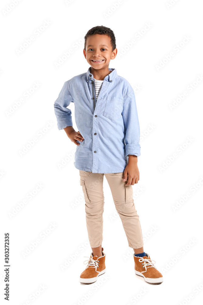 Fashionable African-American boy on white background