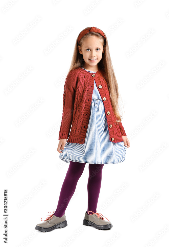 Fashionable little girl in autumn clothes on white background