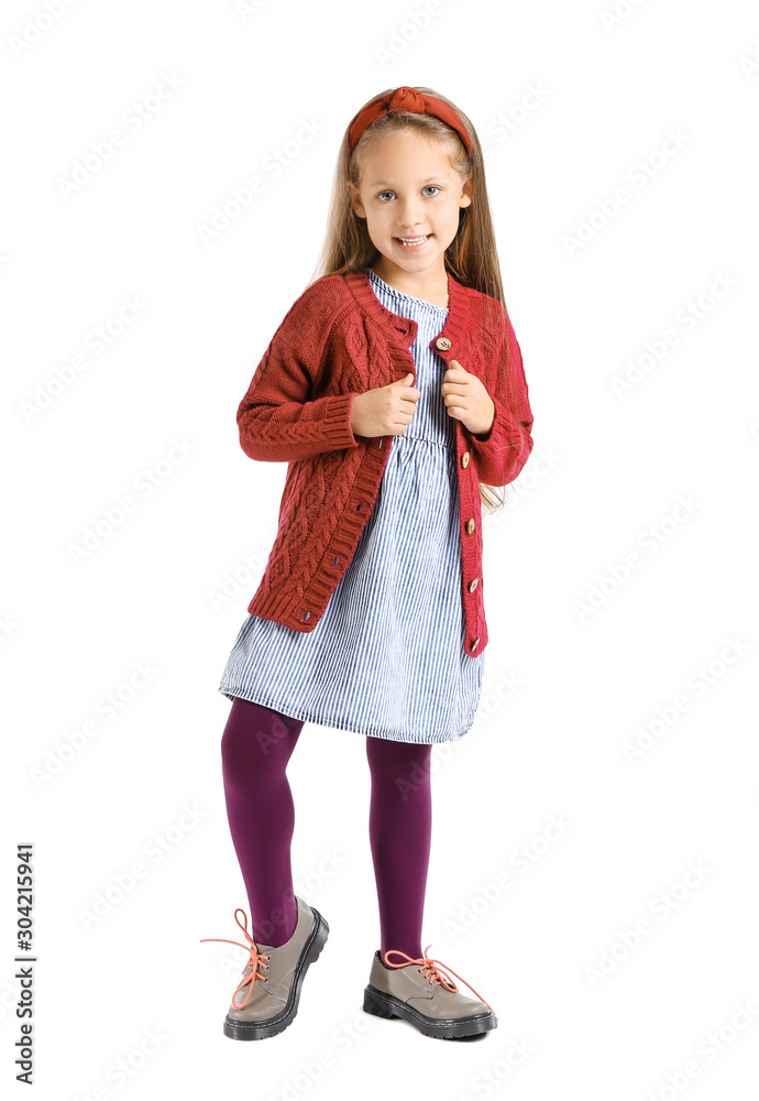 Fashionable little girl in autumn clothes on white background