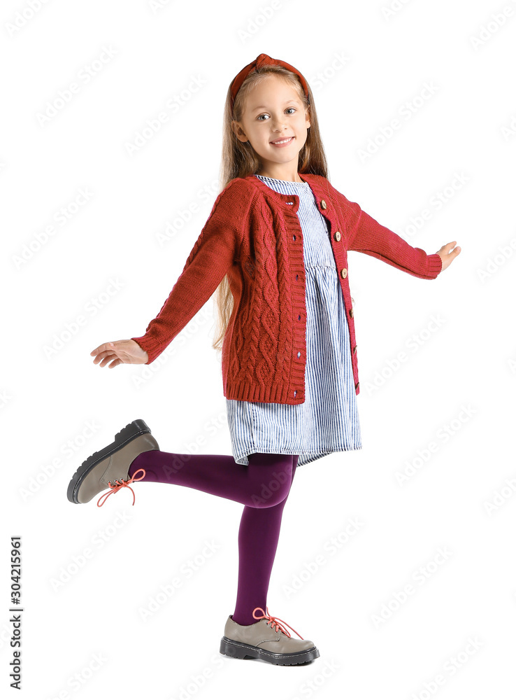 Fashionable little girl in autumn clothes on white background