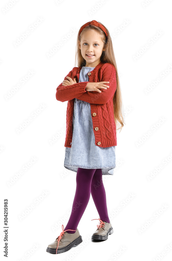 Fashionable little girl in autumn clothes on white background