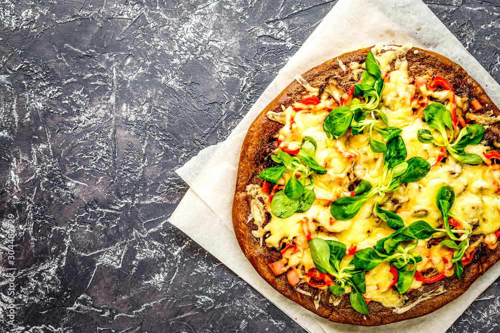 restaurant kitchen with pizza preparing on stone background top view mock up