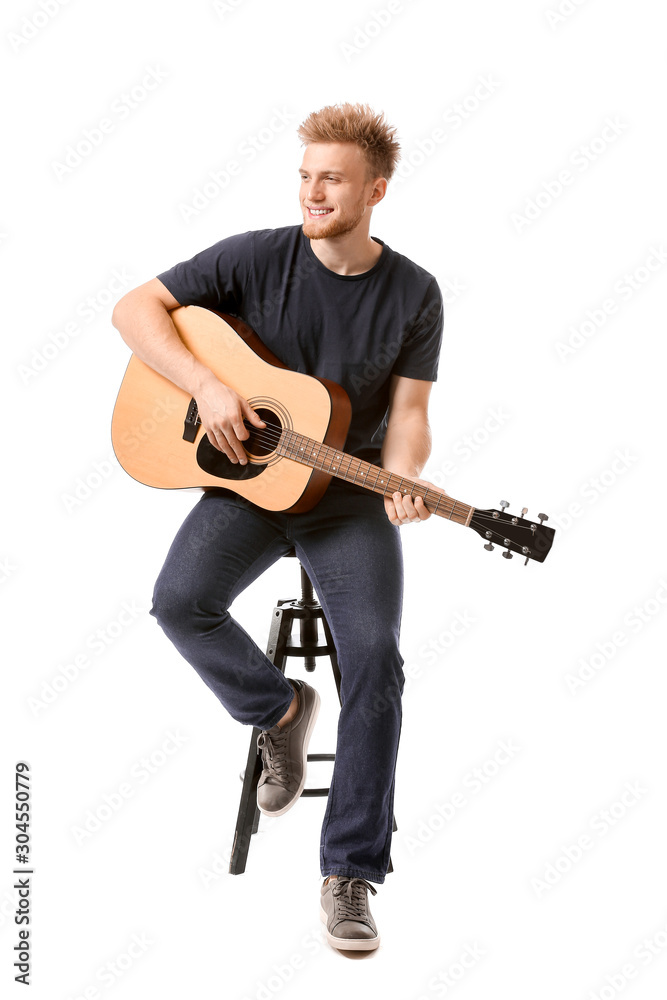 Handsome man with guitar on white background