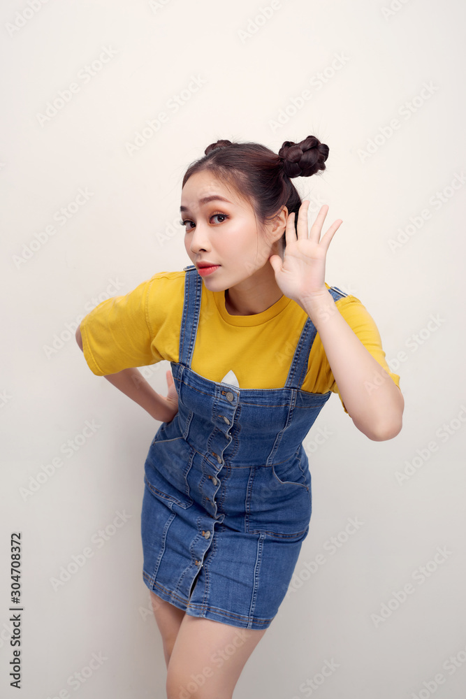 Close-up portrait of nice adorable lovable attractive lovely sweet cheerful funny girl listening to 