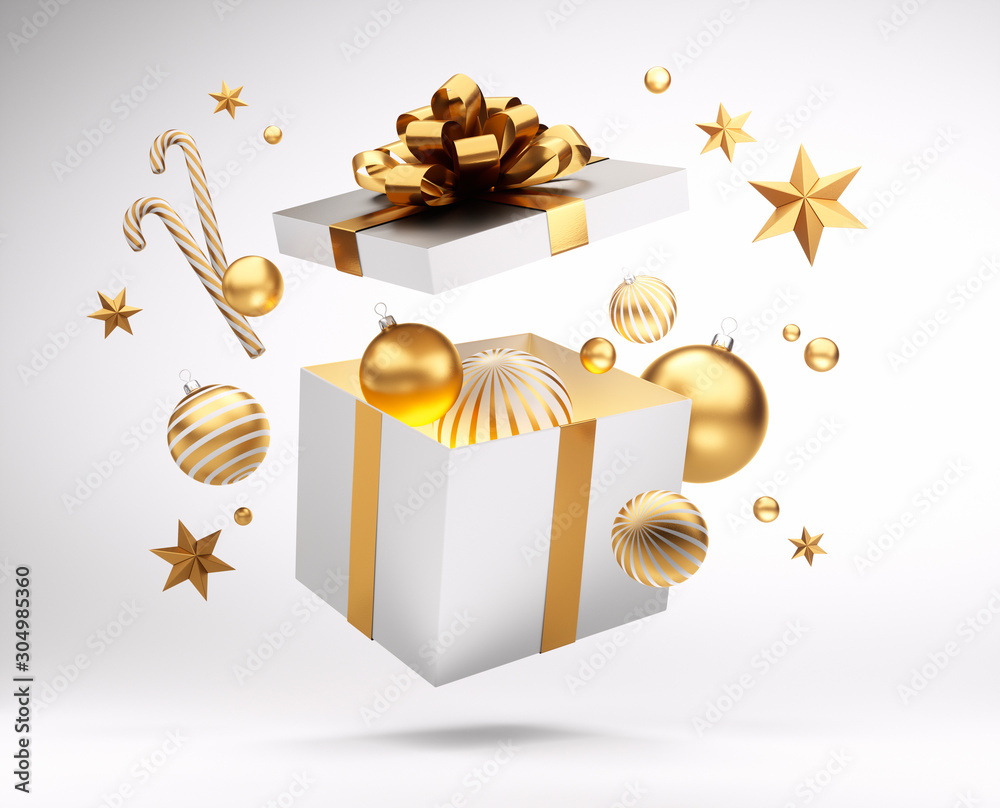 Offene Geschenkbox in Weiß und gold mit Weihnachtsschmuck	