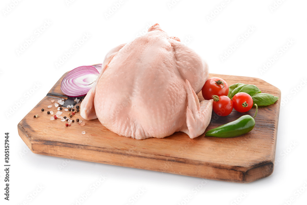 Raw chicken with spices and vegetables on white background