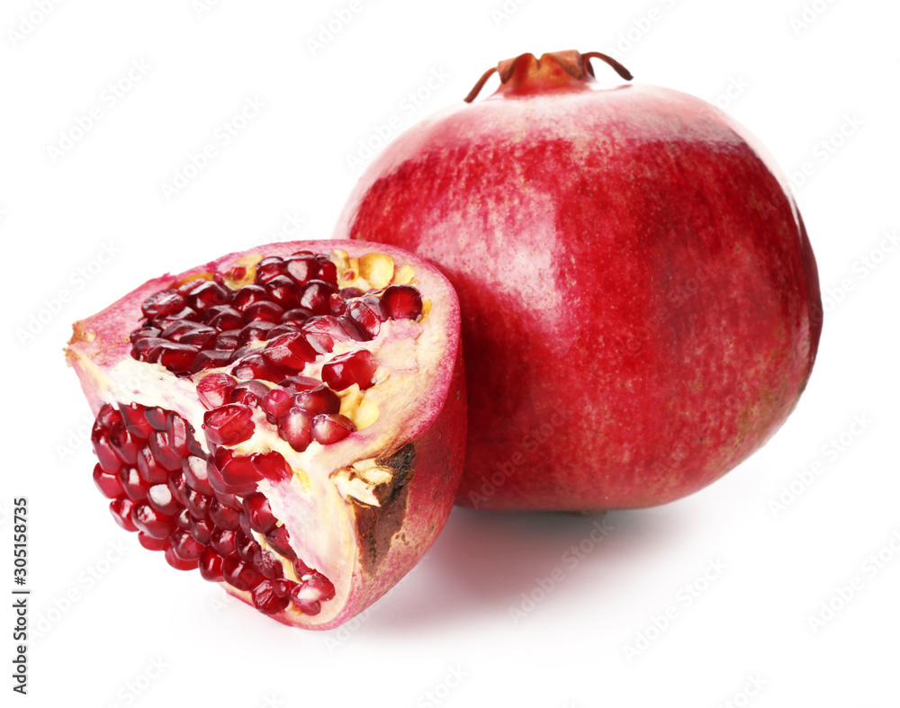 Ripe tasty pomegranate isolated on white