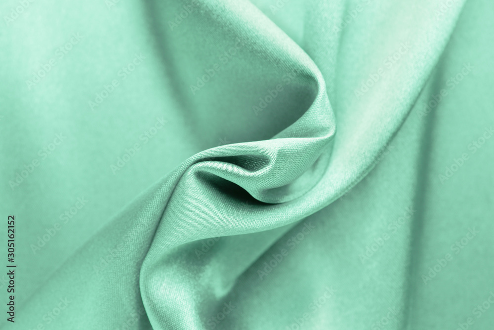 Texture of turquoise fabric, closeup