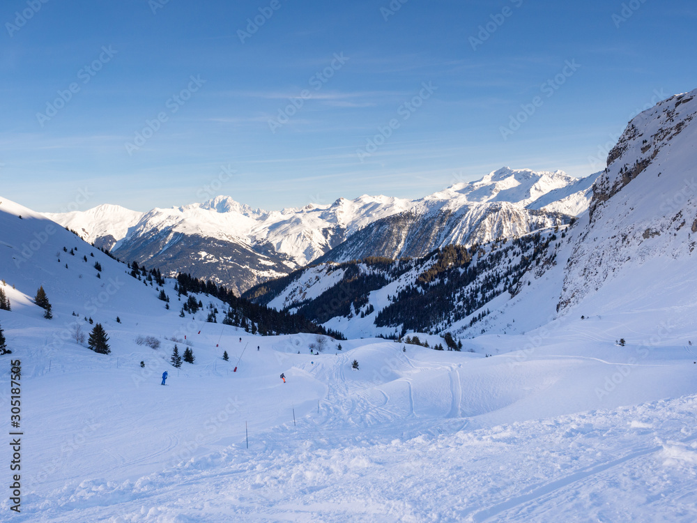 France, February 2018: Mountains with snow in winter. Meribel Ski Resort, Meribel Village Center (14