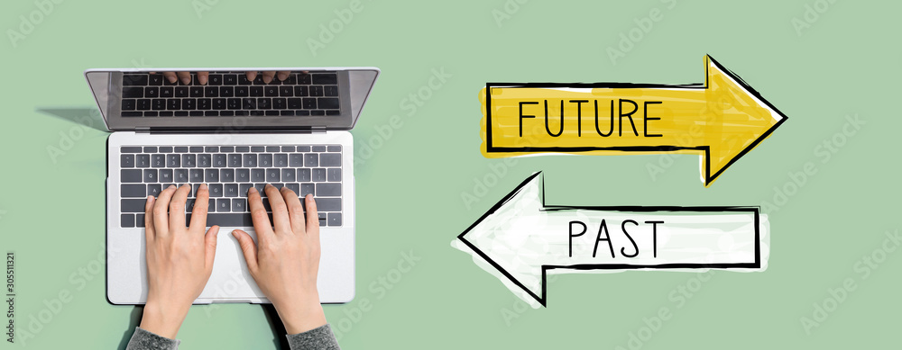 Future or past with person using a laptop computer