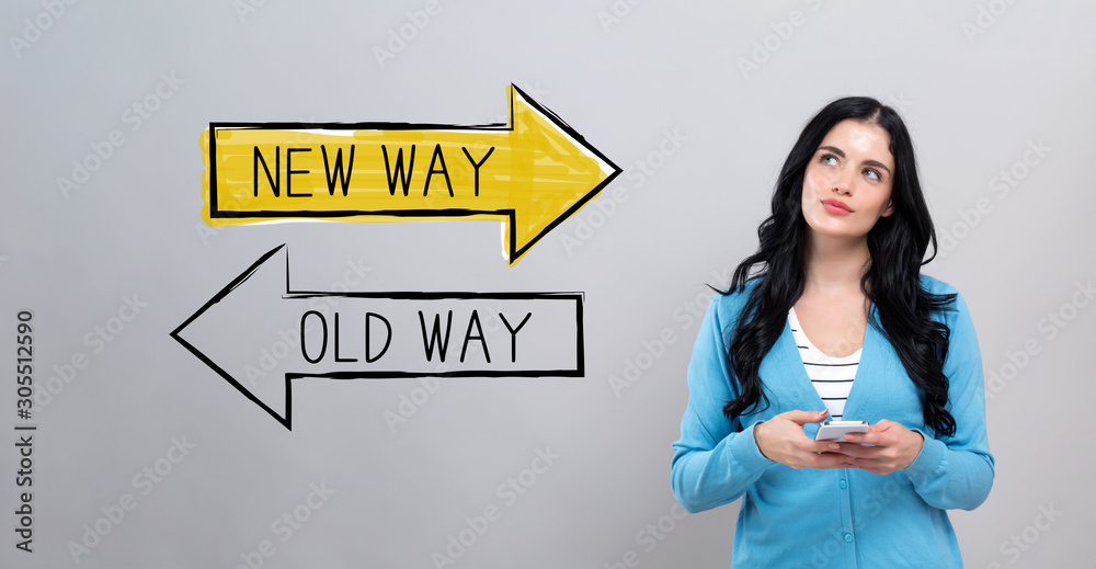 Old way or new way with thoughtful young woman holding a smartphone