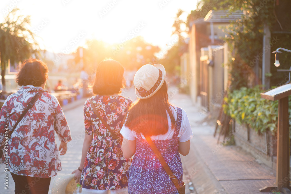 two girls travelling in Hoi An, Vietnam, summer vacation