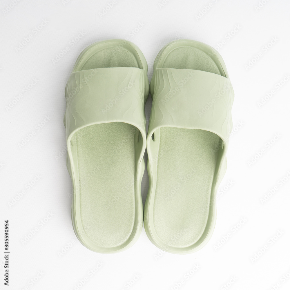 green sandal on the white background