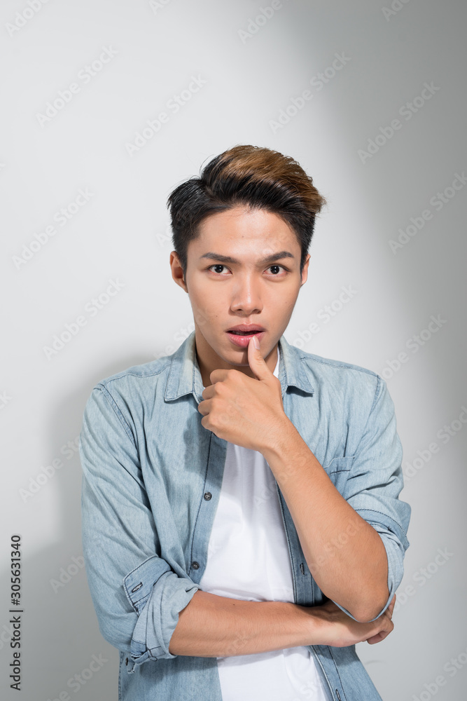 Closeup portrait of attractive young Asian man face