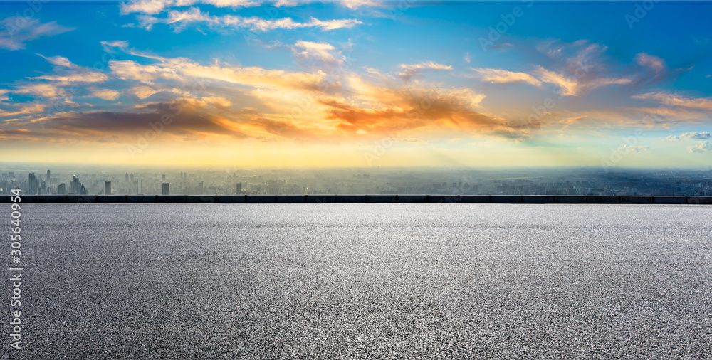 Shanghai city skyline and empty asphalt road scenery at sunset.panoramic view.