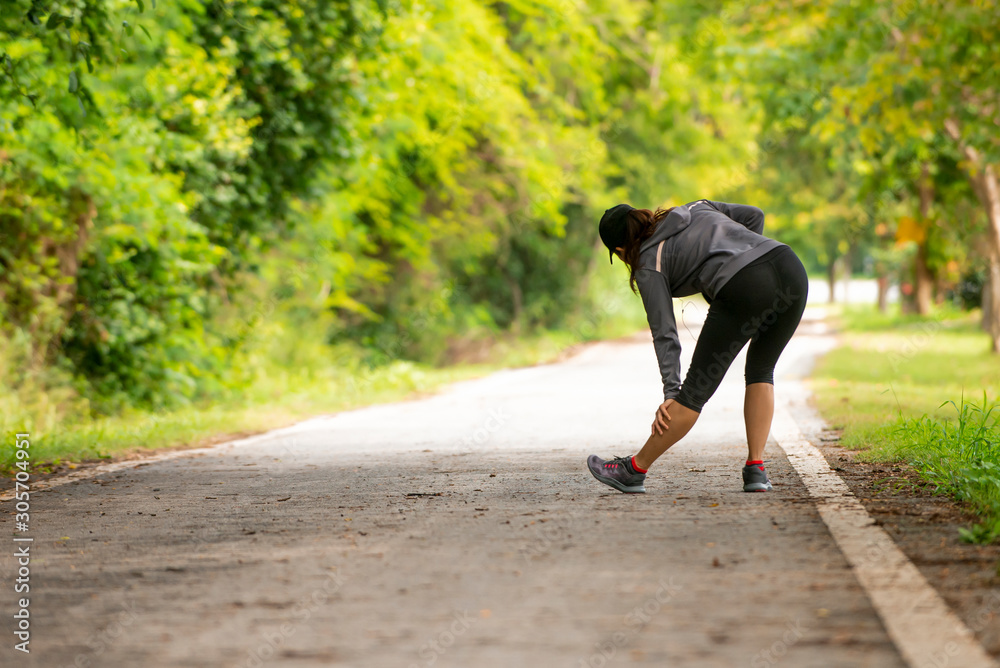 sporty  woman  runner  warm up