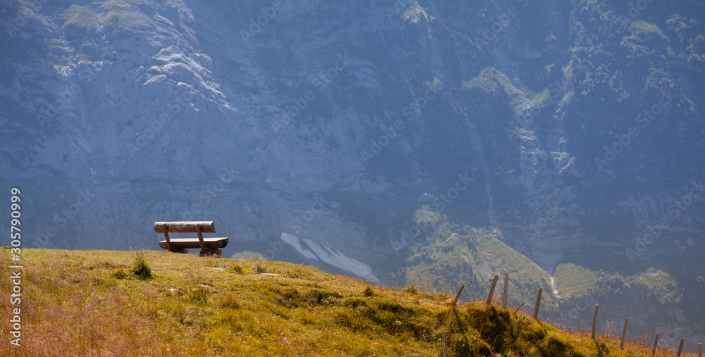 Is a place to sit and watch the mountain view from a high angle on the mountain of Switzerland