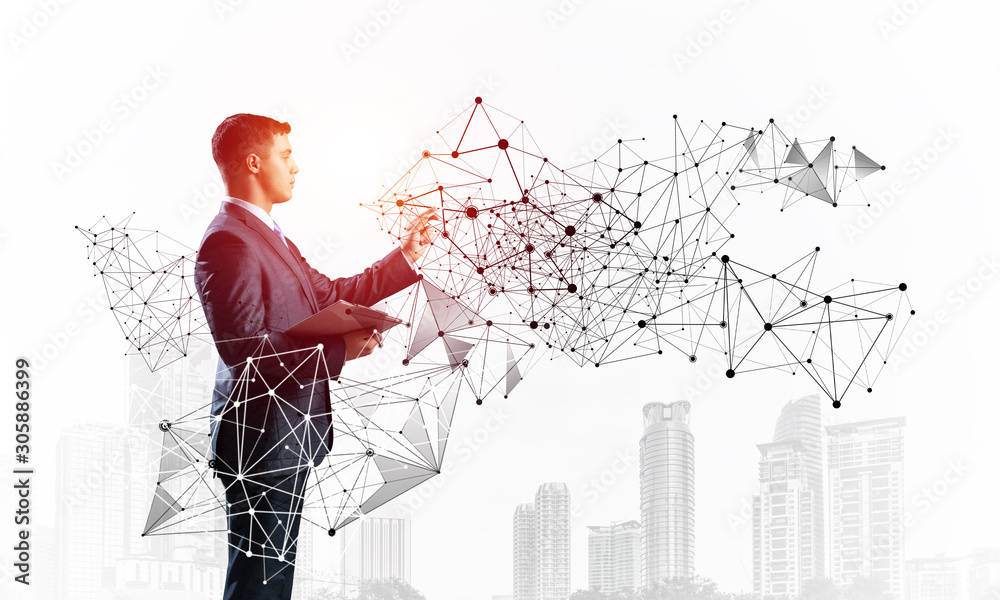 Business person pointing on abstract network