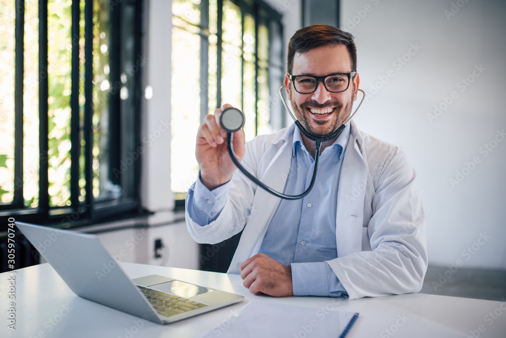 Portrait of a smiling doctor with stethoscope.