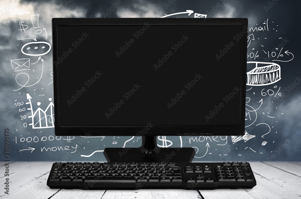 Desktop computer and keyboard on background