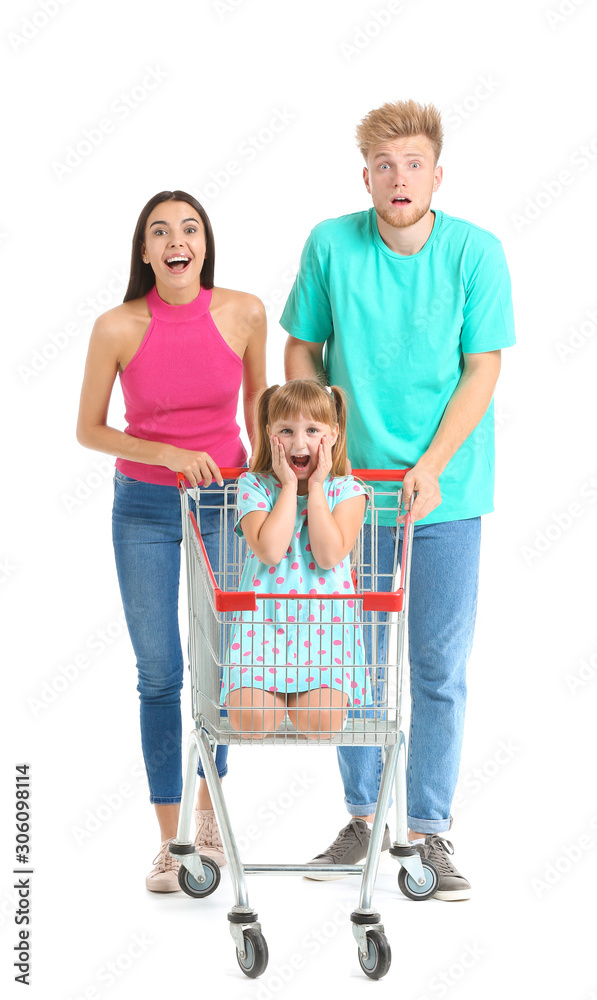 Surprised family with shopping cart on white background