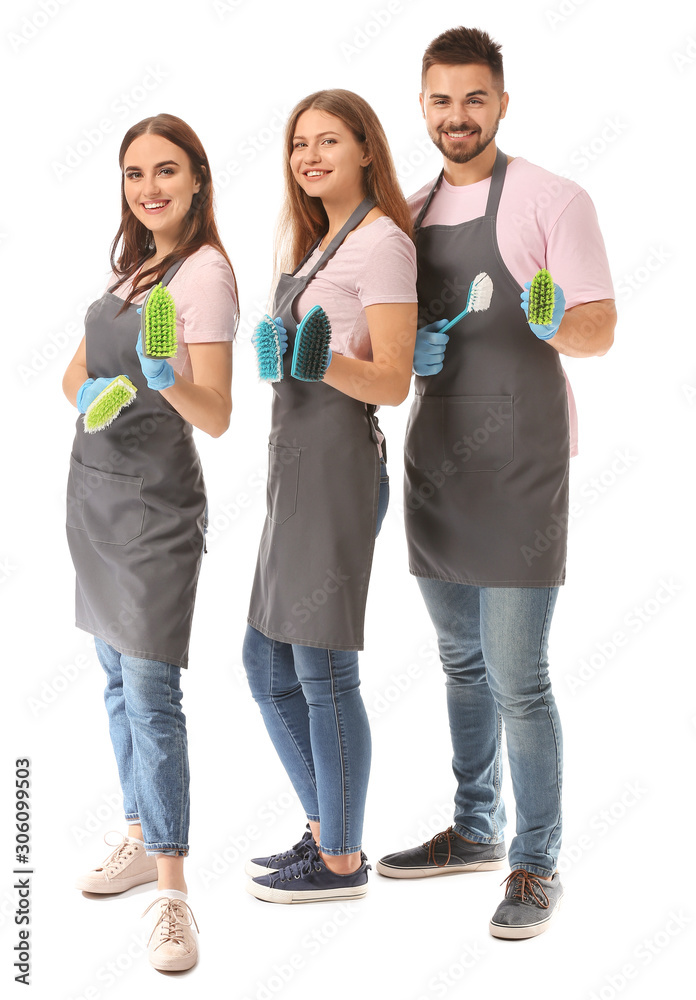 Team of janitors on white background