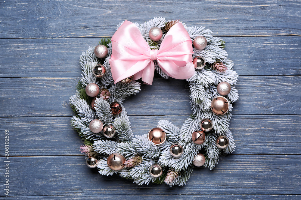 Beautiful Christmas wreath on wooden background