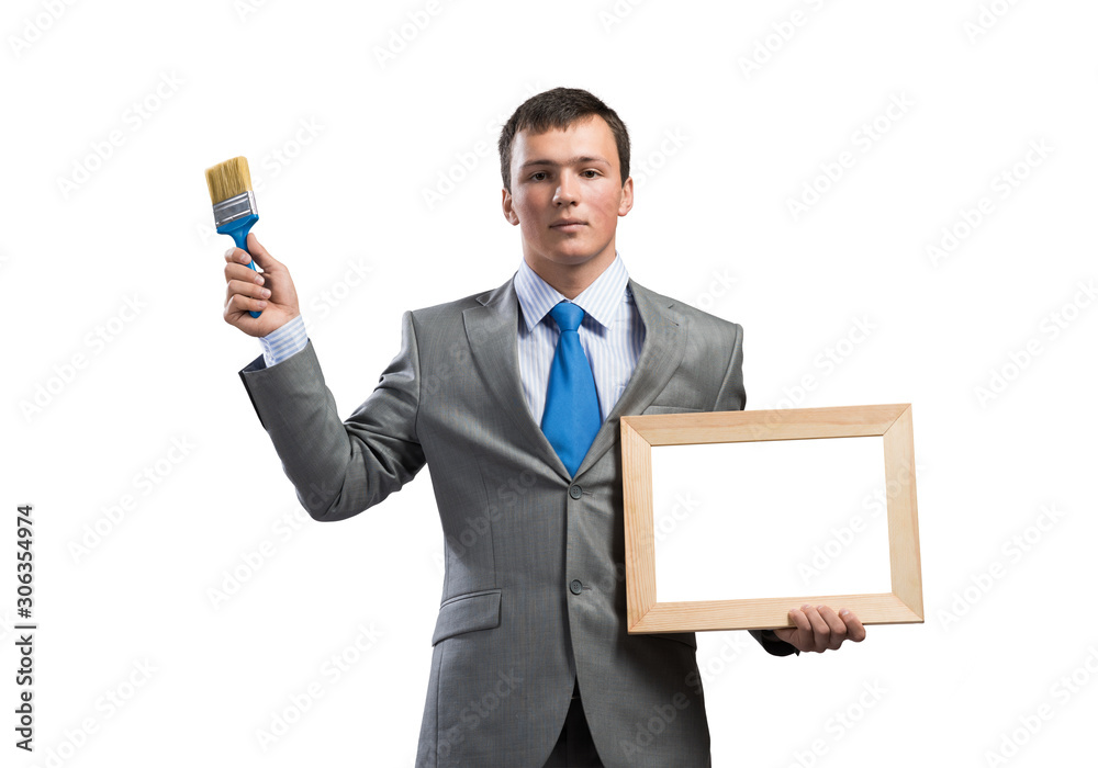 Creative businessman painter holding paintbrush