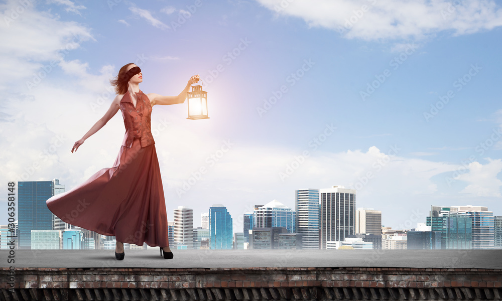 Attractive girl muse with old lantern in hand at summer day. Mixed media