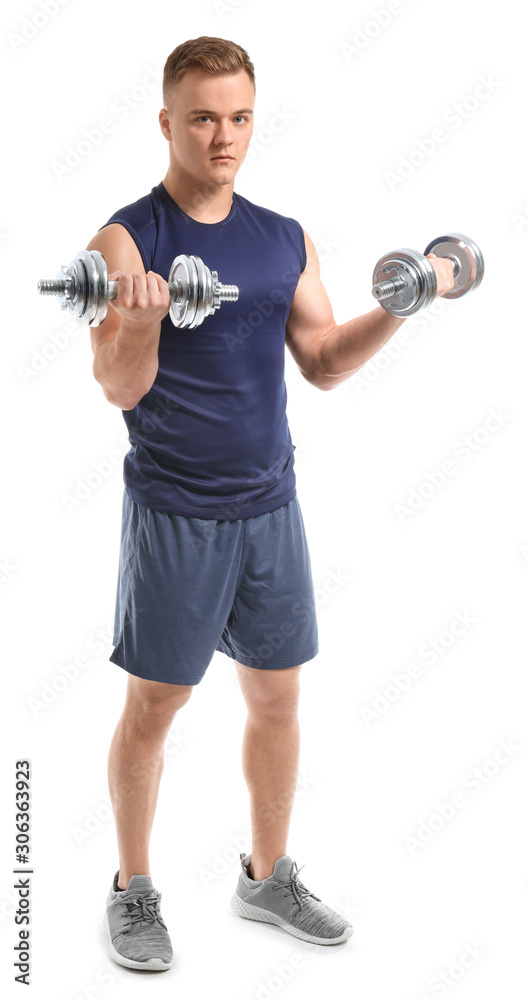 Handsome male bodybuilder with dumbbells isolated on white