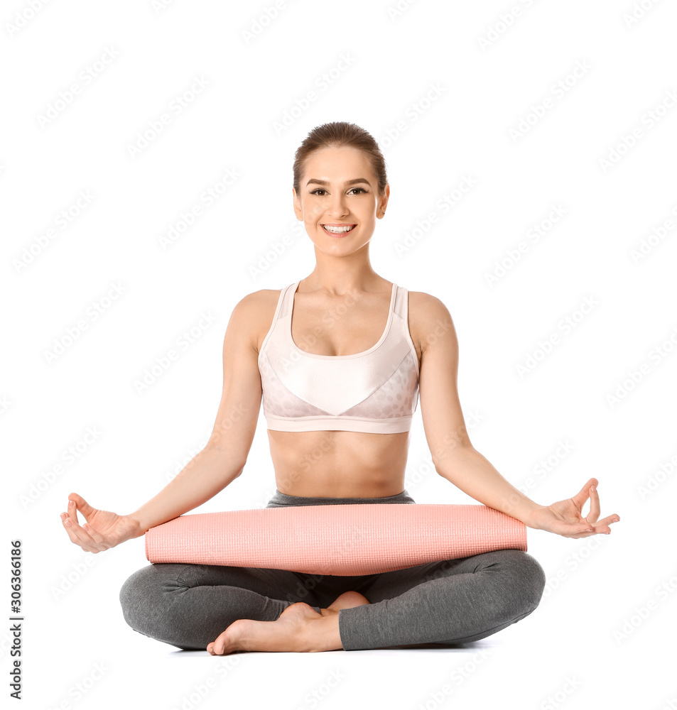 Beautiful young woman practicing yoga on white background