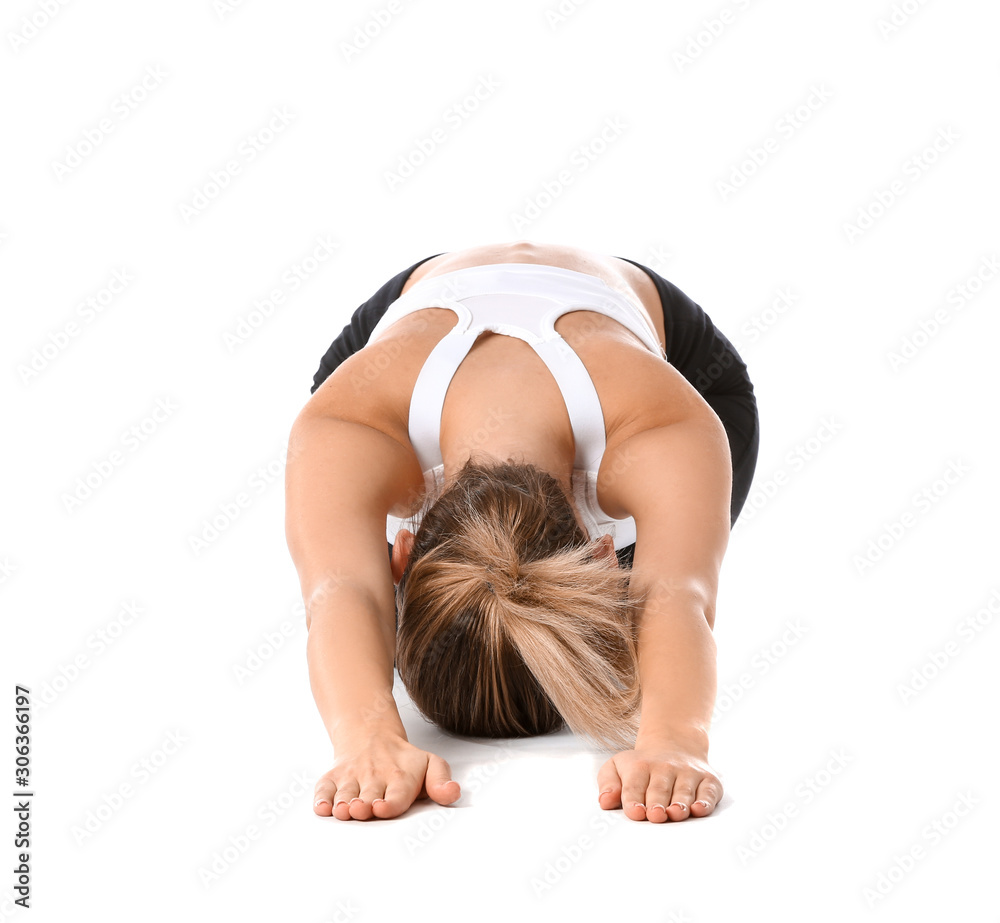 Beautiful young woman practicing yoga on white background