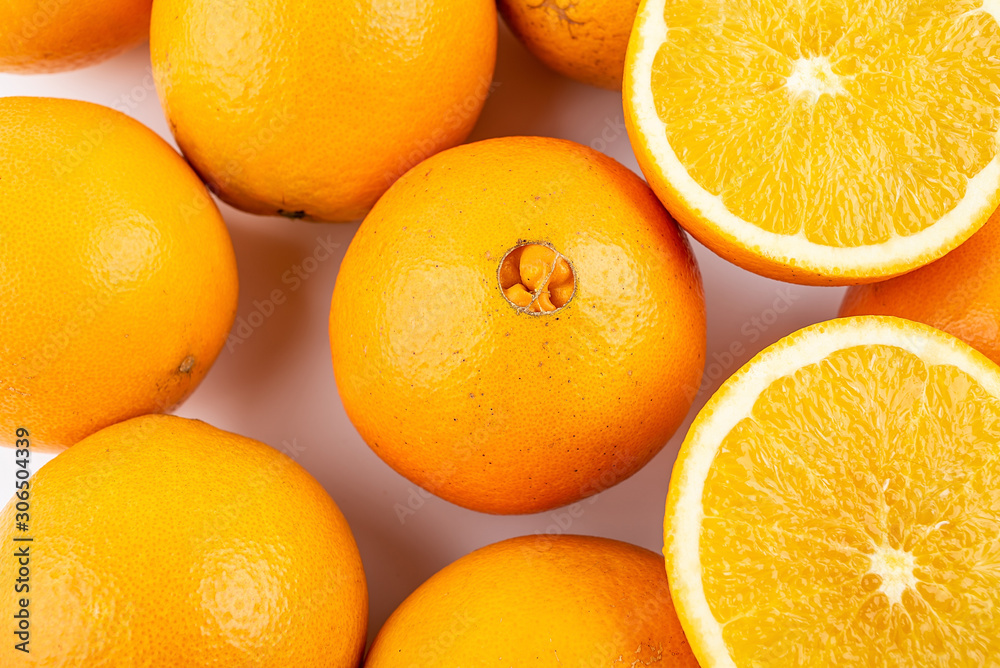 Fresh Nangan Navel Orange and pulp slices on white background