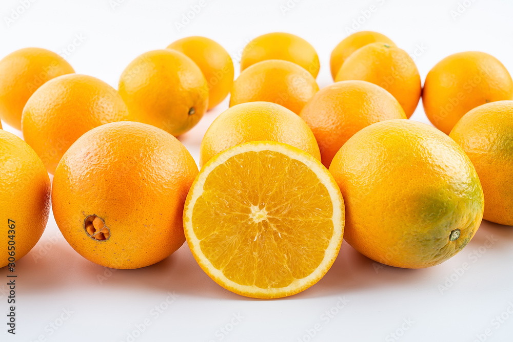 Fresh Nangan Navel Orange and pulp slices on white background