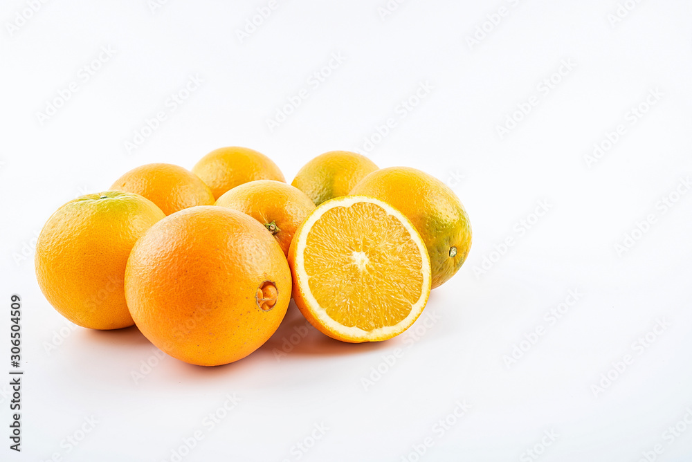 Fresh Nangan Navel Orange and pulp slices on white background