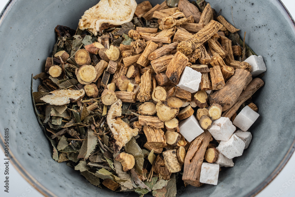 Traditional Chinese medicine concept illustration / close-up of a bowl of traditional Chinese medici