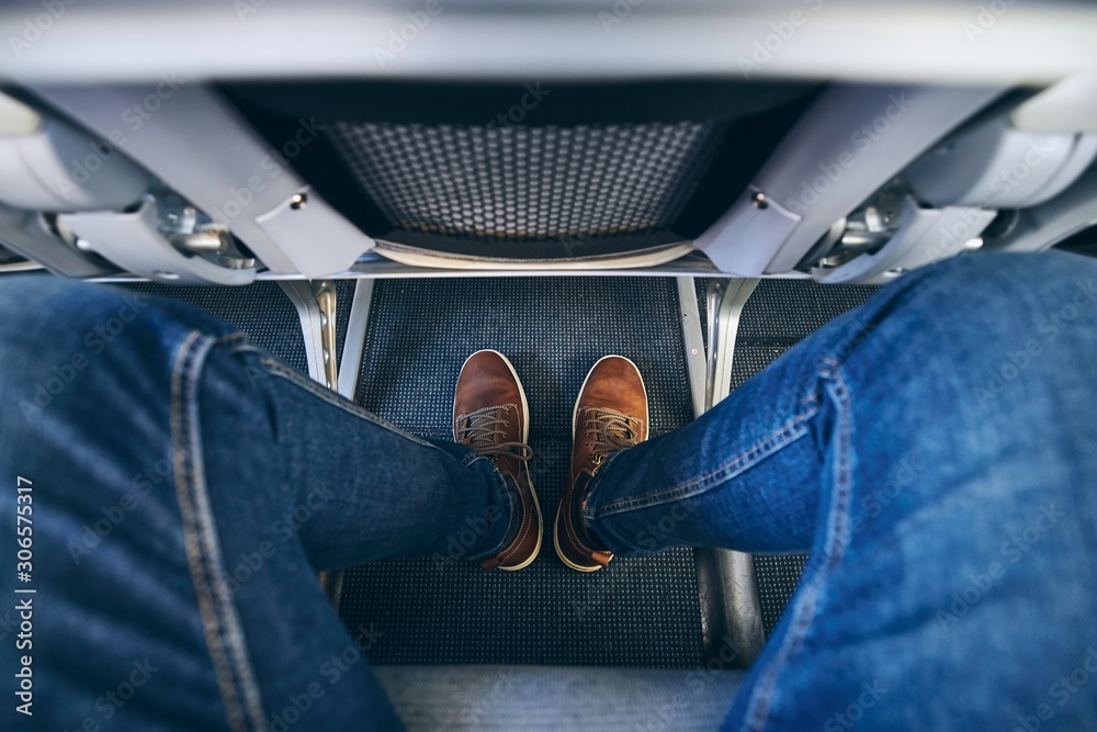 Legroom between seats in airplane