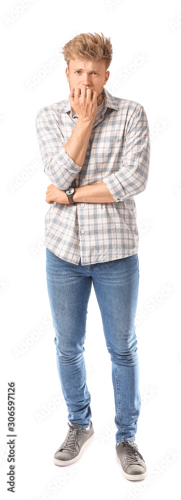 Portrait of scared man on white background