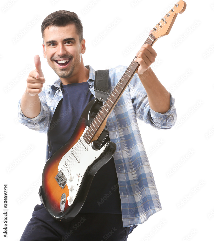 Handsome man playing guitar on white background