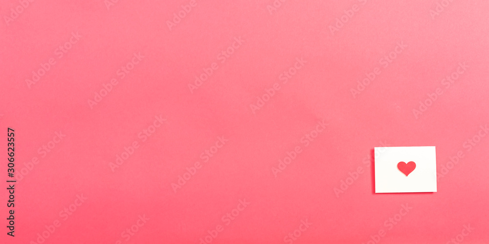 Valentines day note card on a pink paper background