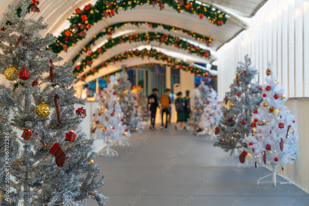 Christmas tree decoration along walkway in city center in Christmas festival of December 2019.