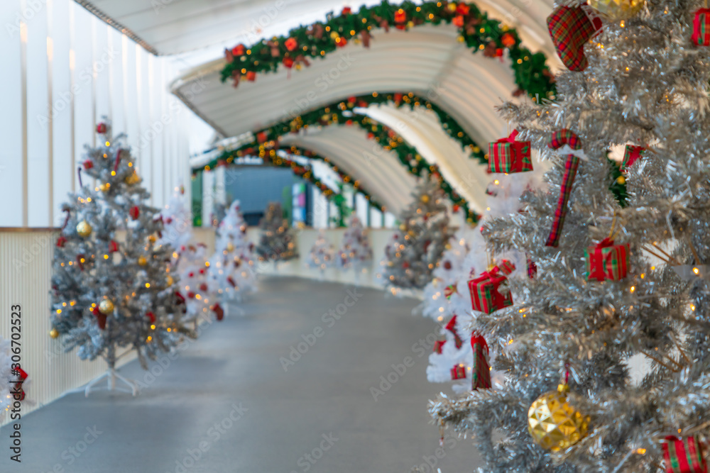 Christmas tree decoration along walkway in city center in Christmas festival of December 2019.