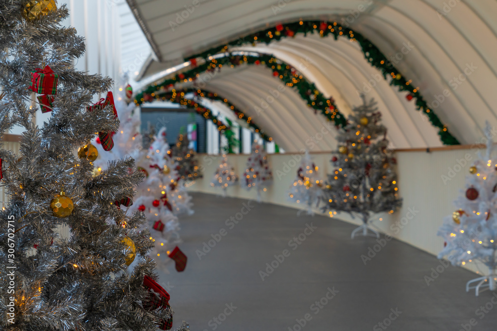 Christmas tree decoration along walkway in city center in Christmas festival of December 2019.